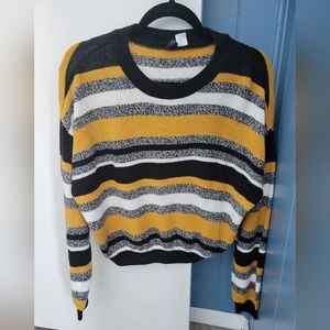 Black, white, and yellow striped sweater